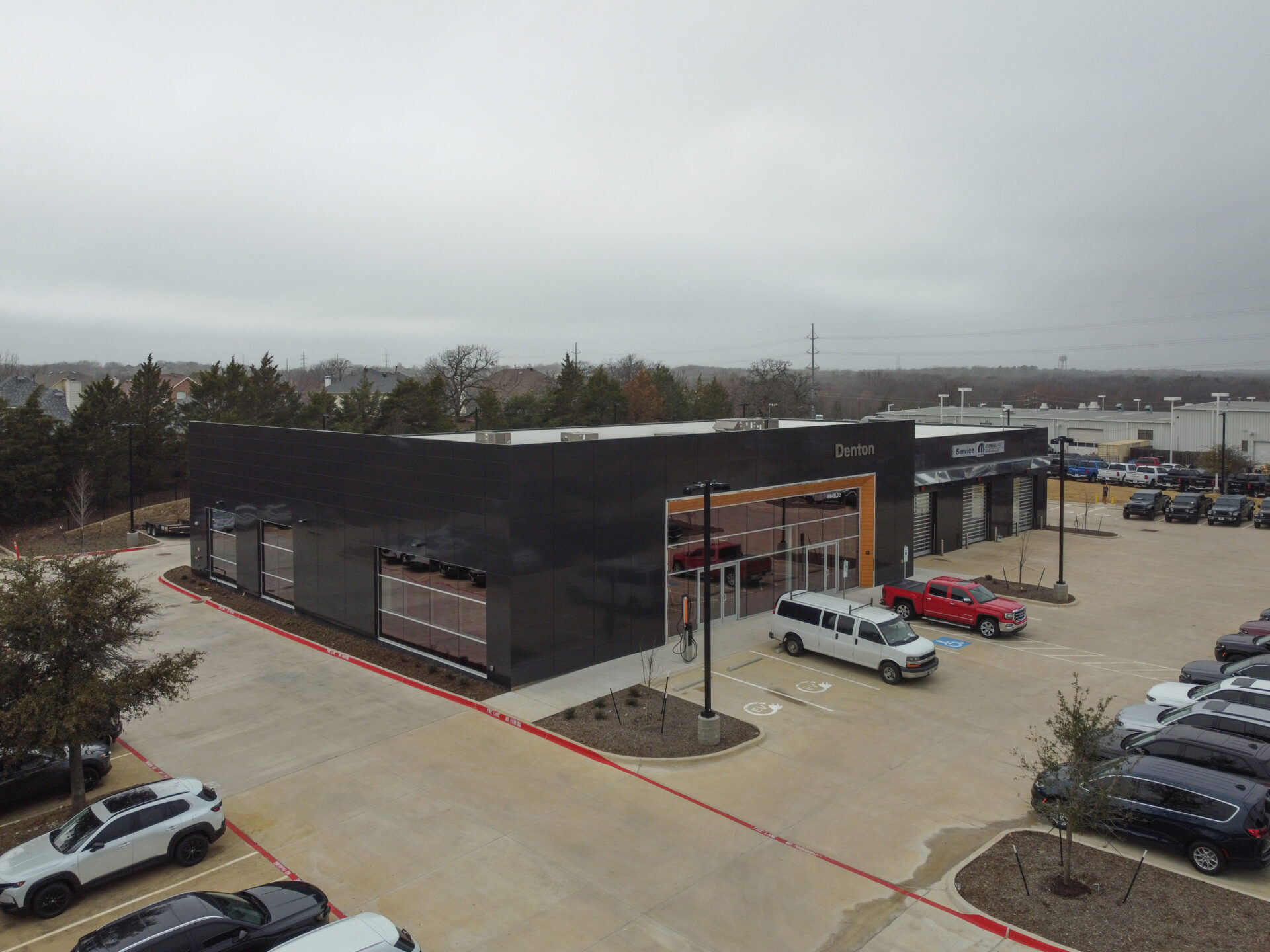 Exterior view of Denton Dodge Chrysler Jeep Ram service reception building