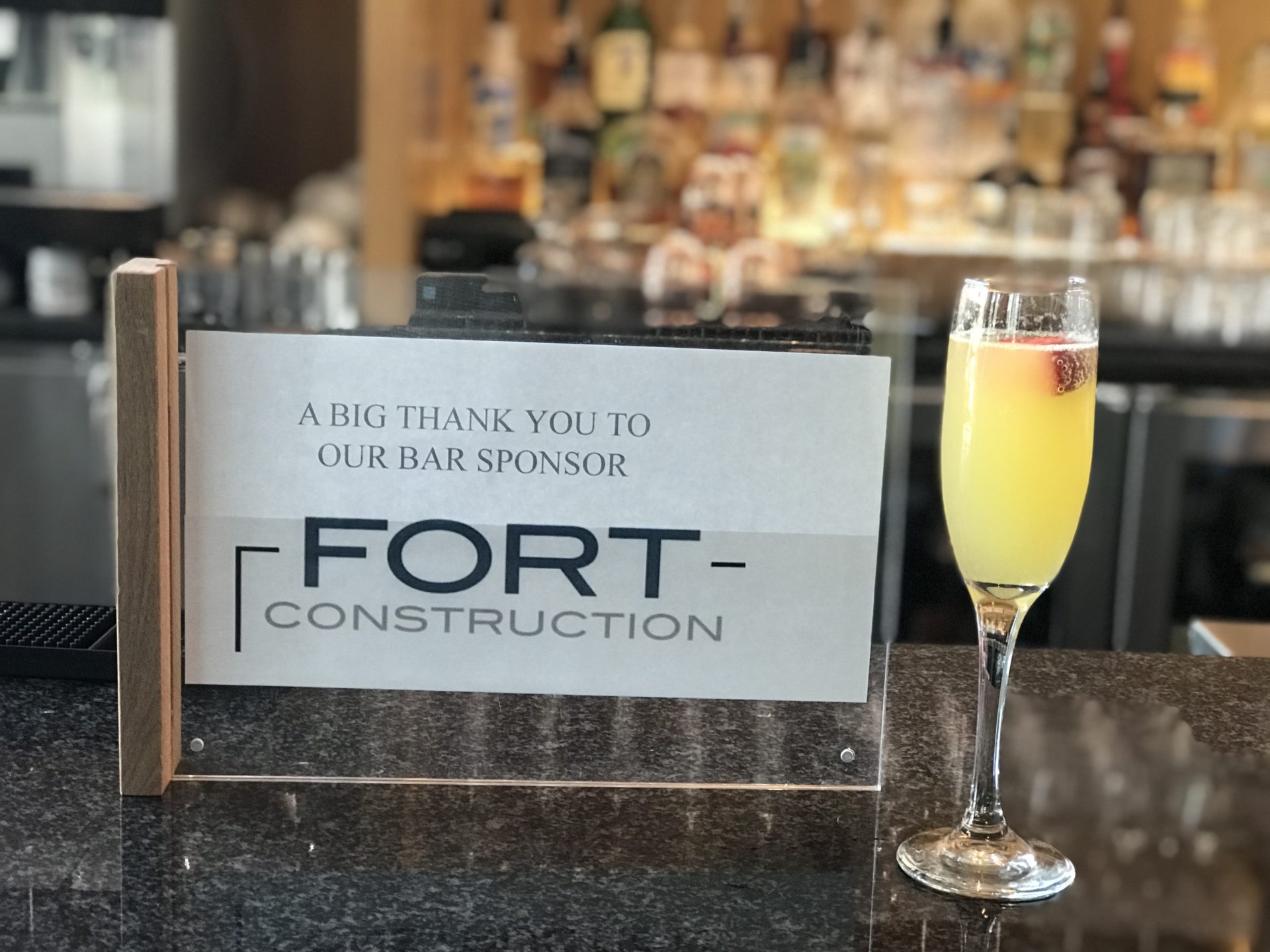 Fort sponsor card of mimosa bar at AIA Awards ceremony in Fort Worth