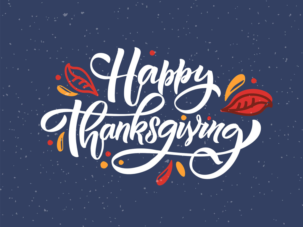 Graphic provided by Fort Construction. Image shows a blue background with text that says, 'Happy Thanksgiving.'